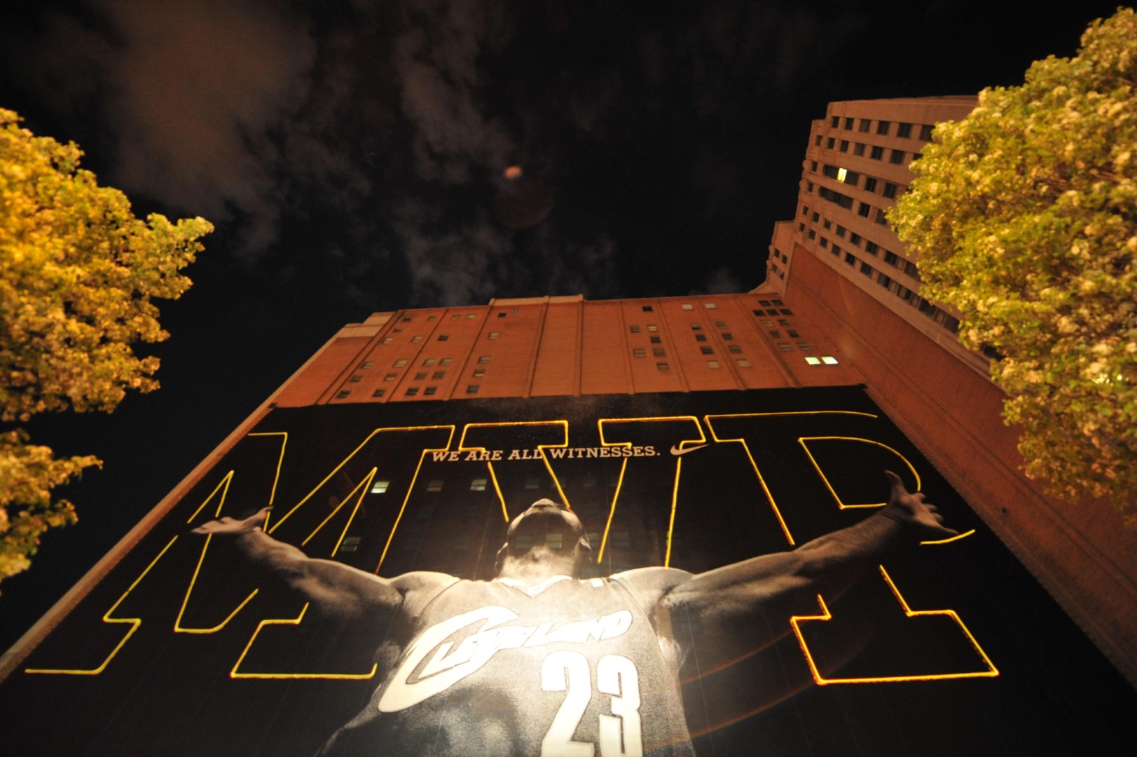 High powered lasers create a massive scale drawing on a Cleveland building for LeBron James MVP